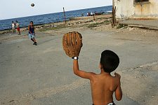Children play baseball at Havana suburds. Baseball is a national sport. Most people like to play it or just tot root for the players. Habana, Cuba, Monday, Feb. 26, 2007.