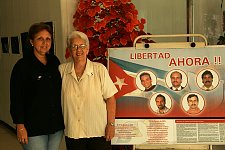 Mirta Rodriguez Perer and Maria E. Guerrera Rodriguez - mother of Antonio Guerrero (one of the five prisoners) and his sister against the background of the poster with the portraits of all the five Cubans, charged of espionage.  Habana, Cuba, Wednesday, Feb. 28, 2007.