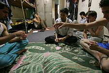 A card game in a room of a students' dormitory in Teheran, Iran on Sunday, April 30, 2006.