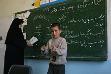 Primary school student answers at the blackboard. Gonbad-e Kavus, Iran, Thursday, April 20, 2006.