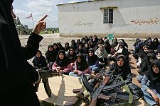 A lesson of weapon handling for high school students. Gonbad-e Kavus, Iran, Thursday, April 20, 2006.