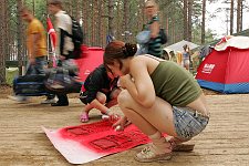 Activists of the pro-Kremlin Nashi (Ours) youth movement drawing propoganda visual aids in the Nashi summer camp on Lake Seliger, some 300 kilometres (~180 miles) northwest of Moscow, Sunday, July 15, 2007. Pro-Kremlin Nashi (Ours) youth movement has assembled about 10 thousand young people from all over Russia to a summer camp where they are going to do sports and attend political and socially oriented lectures and training sessions for two weeks.