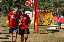 A scene of daily life in the Nashi summer camp on Lake Seliger, some 300 kilometres (~180 miles) northwest of Moscow, Tuesday, July 17, 2007. The yellow banner with the cartoons showing the President of the Ukraine Yuschenko and July Timoshenko. Pro-Kremlin Nashi (Ours) youth movement has assembled about 10 thousand young people from all over Russia to a summer camp where they are going to do sports and attend political and socially oriented lectures and training sessions for two weeks.