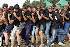 Activists of the Volunteer Fighting Brigade of the pro-Kremlin Nashi (Ours) youth movement taking part in a riot drill session in the Nashi summer camp on Lake Seliger, some 300 kilometres (~180 miles) northwest of Moscow, Wednesday, July 18, 2007. Pro-Kremlin Nashi (Ours) youth movement has assembled about 10 thousand young people from all over Russia to a summer camp where they are going to do sports and attend political and socially oriented lectures and training sessions for two weeks.