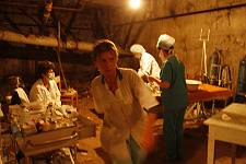 Doctors in the basement of the ruined hospital, Monday August 11, 2008. 