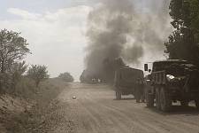 A moment after the bombardment of the convoy by the Georgian aircraft on the road from Tshinvali to Russia, Monday August 11, 2008. 