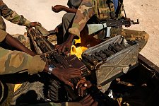 The pick-up truck with a large-caliber machine-gun installed in it. Los Anod, SomaliLand, Tuesday, October 16, 2007. The military constantly camp near Los Anod in the province of  SomaliLand, bordering on PuntLand. Fighting is resumed at this territory from time to time.