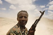 The Somaliland Army soldier covered in dust while patrolling the territory. Los Anod, SomaliLand, Tuesday, October 16, 2007. The military constantly camp near Los Anod in the province of  SomaliLand, bordering on PuntLand. Fighting is resumed at this territory from time to time.