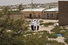 Three schoolgirls outdoors. Hargeisa, SomaliLand, Saturday, October 6, 2007. For 16 years Somaliland has already been an actually independent state. It has its own constitution, relatively stable political system and comparatively efficient government, army, police as well as the currency of it's own. Nevertheless not a single country has so far recognized the sovereignty of Somaliland.