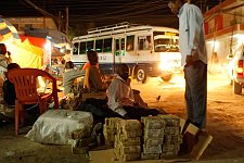 Street money changers at work. Hargeisa, SomaliLand, Tuesday, October 9, 2007. The largest denomination bank note in the country - 500 shillings - is equal to 8 American cents. Besides it 100 and 50 shilling banknotes are in circulation as well.